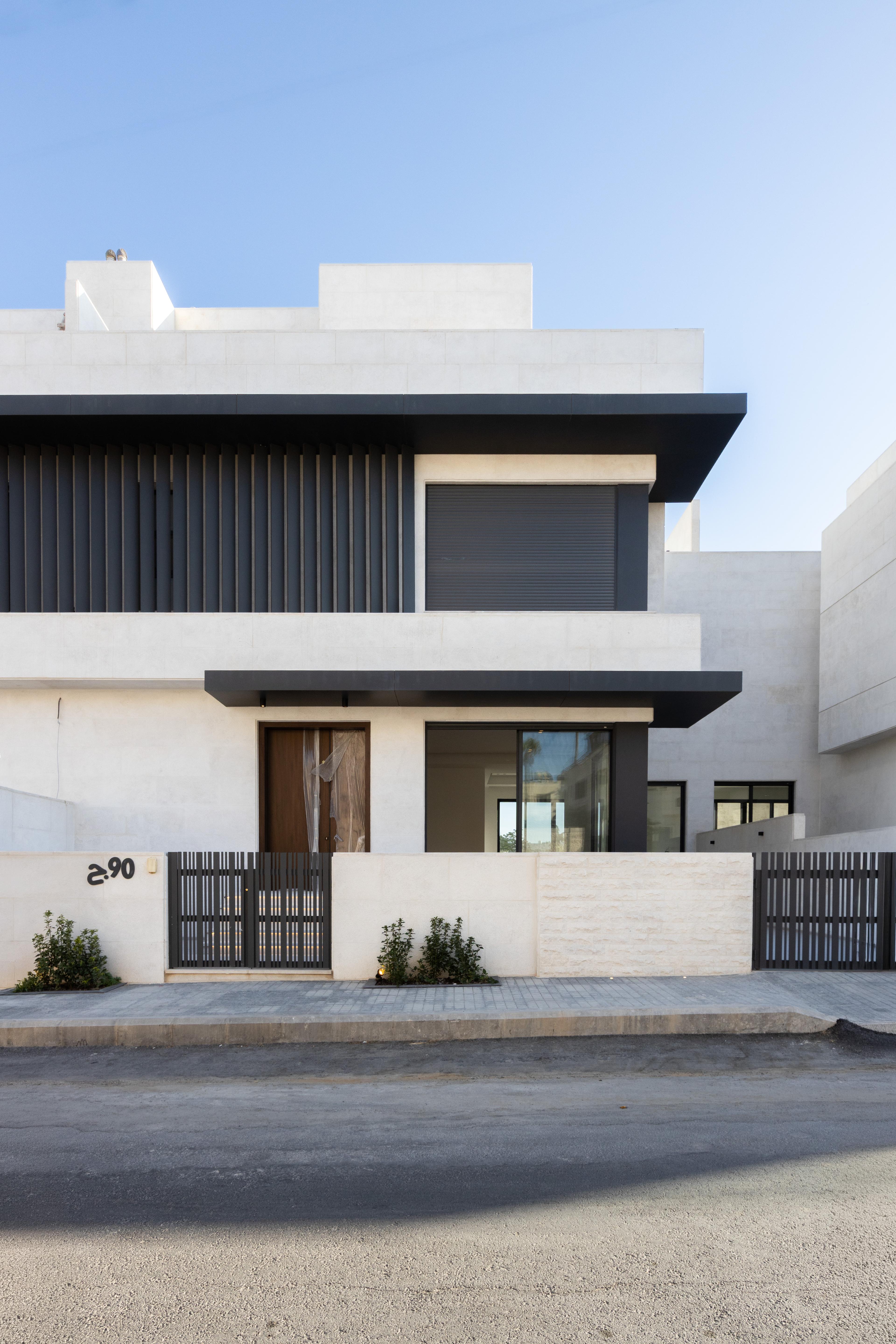 Modern white villa exterior in Abdoun, Amman